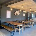 Cushman Wakefield - Church Street | Product Seen: [Walnut x Dart Dining Table – 2000, Anderson Dining Bench – Customisable & Osaka Halved-Arm Chair - V3]